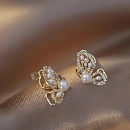 Ethereal Winged Gold Earrings