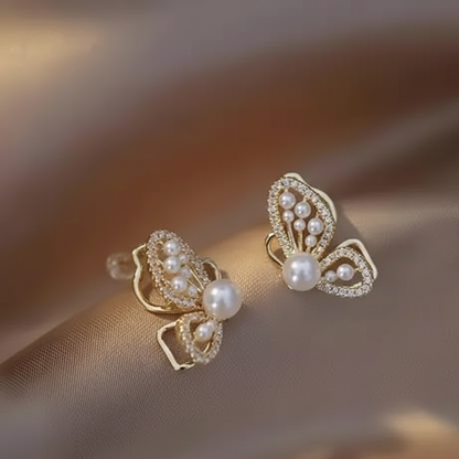 Ethereal Winged Gold Earrings